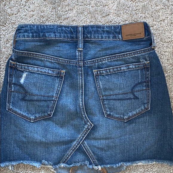 Denim skirt with rips - Picture 2 of 3
